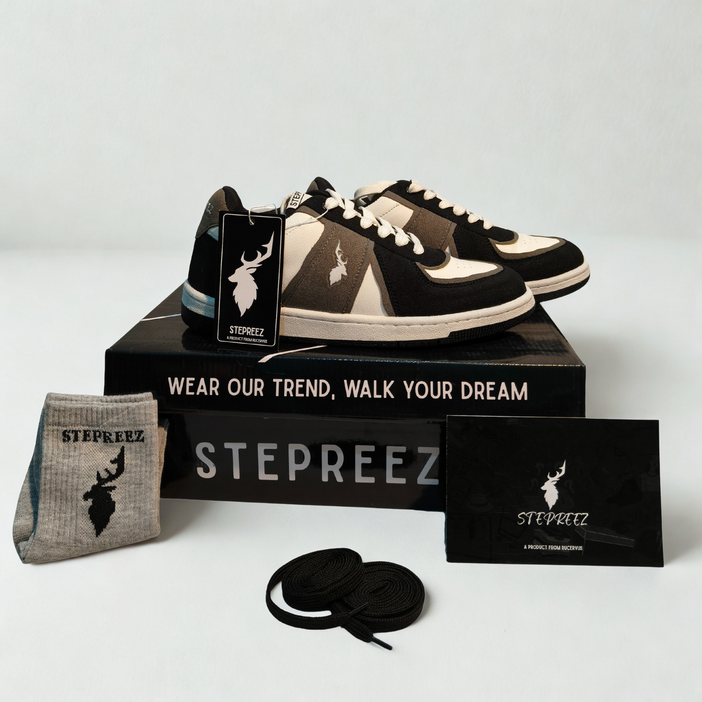 Monochrome sneakers unboxing – includes black and white shoes, branded box, extra laces, and logo socks
