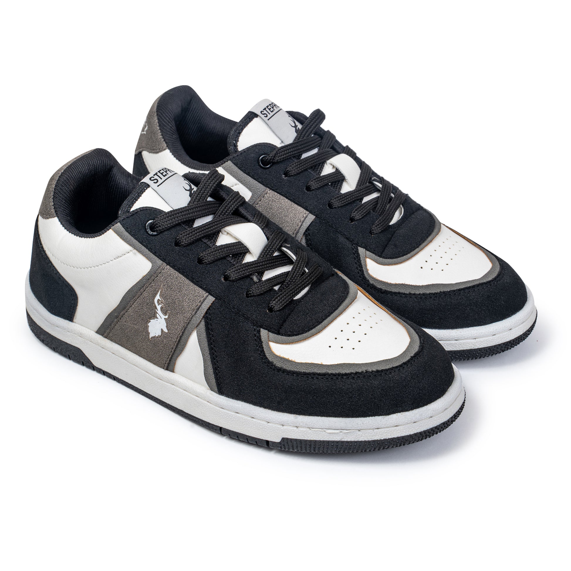 Monochrome sneakers. black, white, and grey low-top casual shoes for men with suede overlays and lace-up design