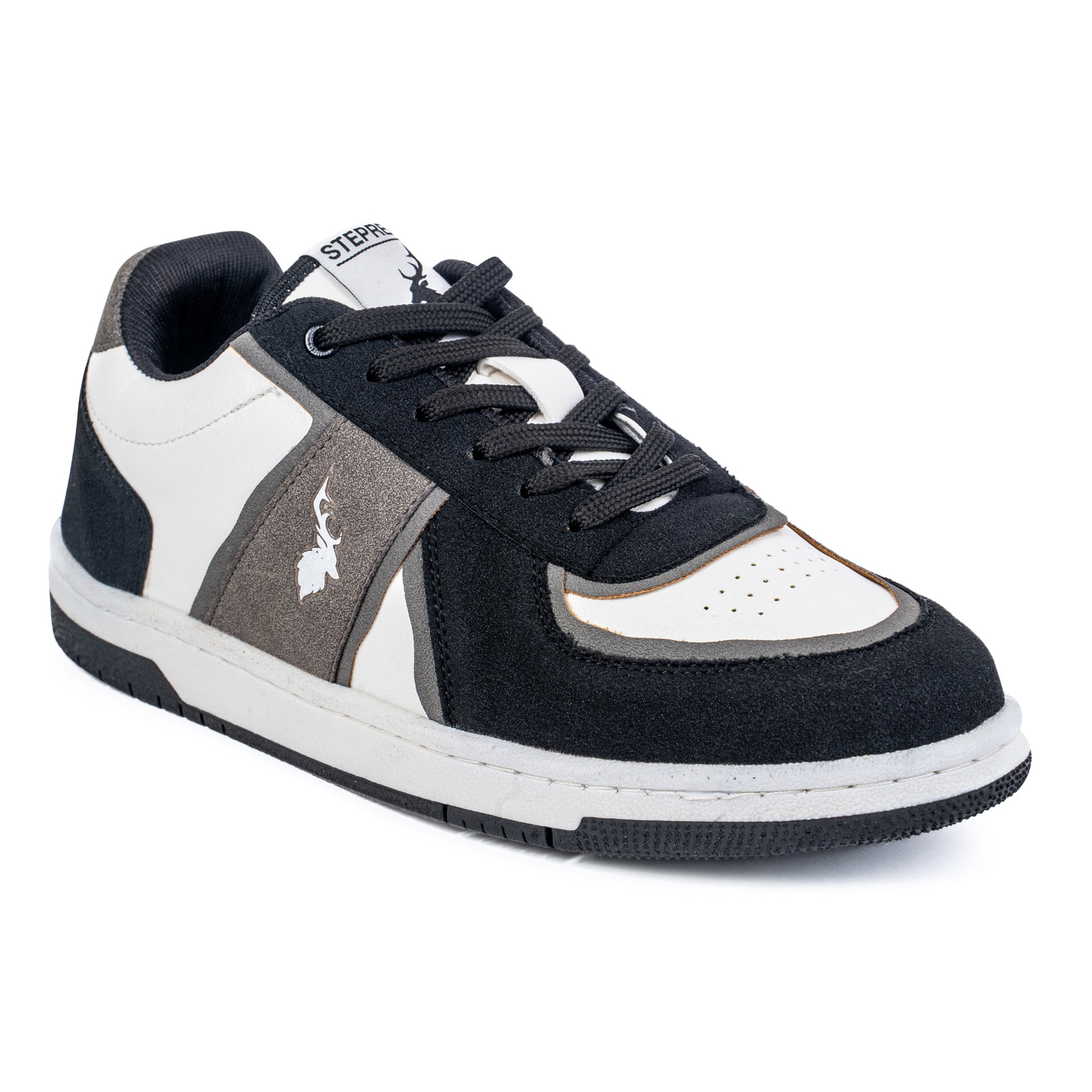 Angled rear shot of monochrome sneakers highlighting heel detailing, suede construction, and textured black sole