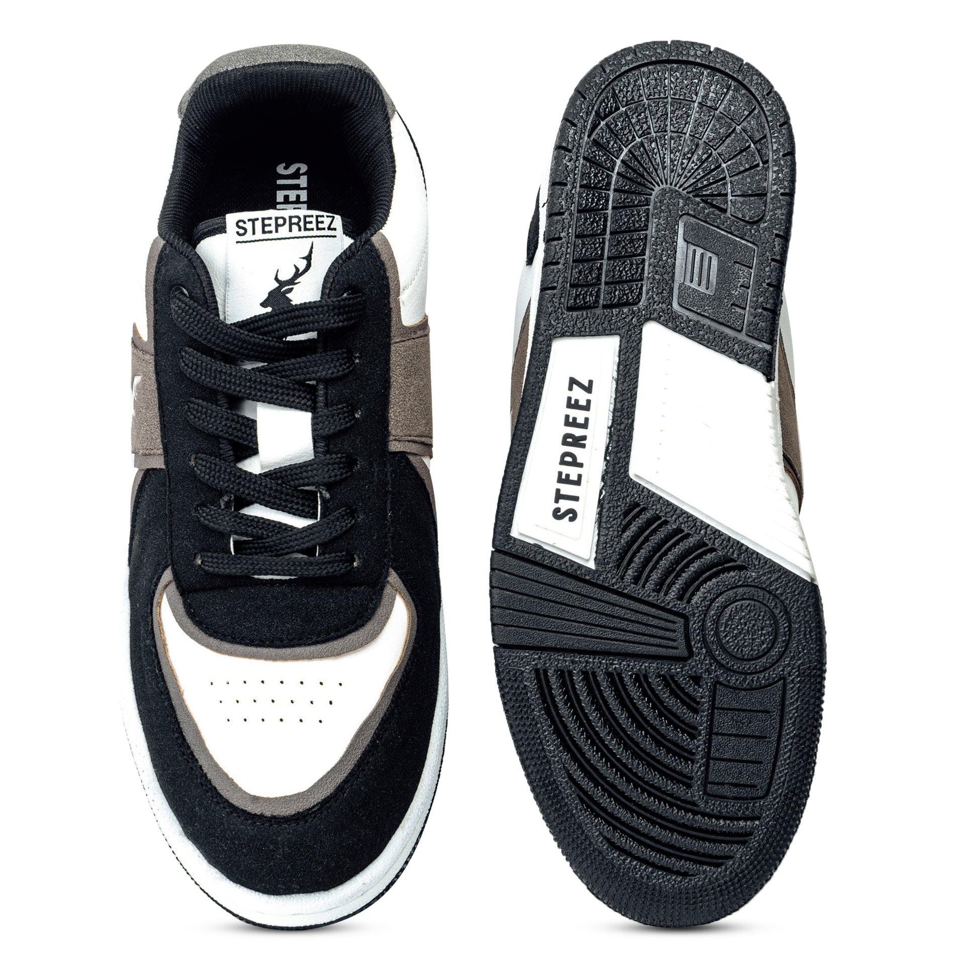 Top and sole view of Monochrome sneakers,  showcasing rubber grip outsole, cushioned insole, and classic lace-up build